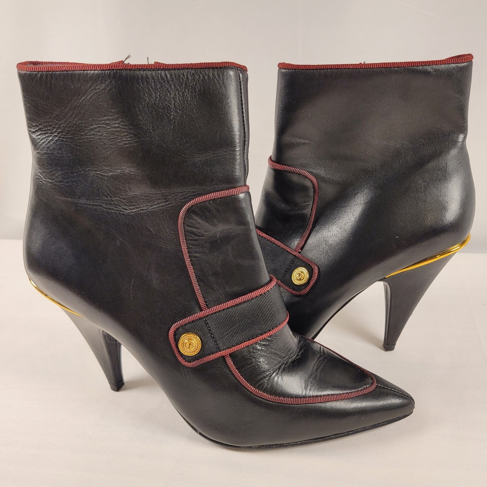 Chic Black Heeled Boots with Gold Detail
